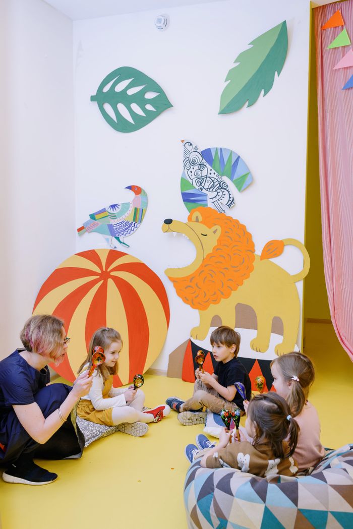 Children listening to their teacher during story time