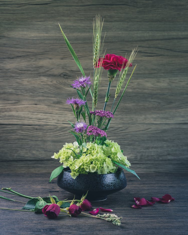 Ikebana Flower Arrangement With Green And Pink Flowers