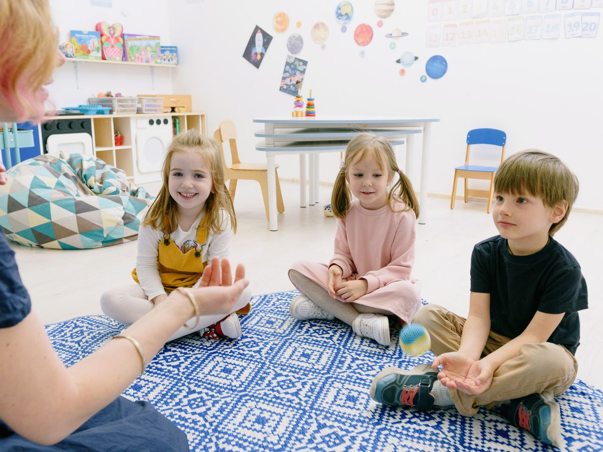 A child playing with colourful early-years materials