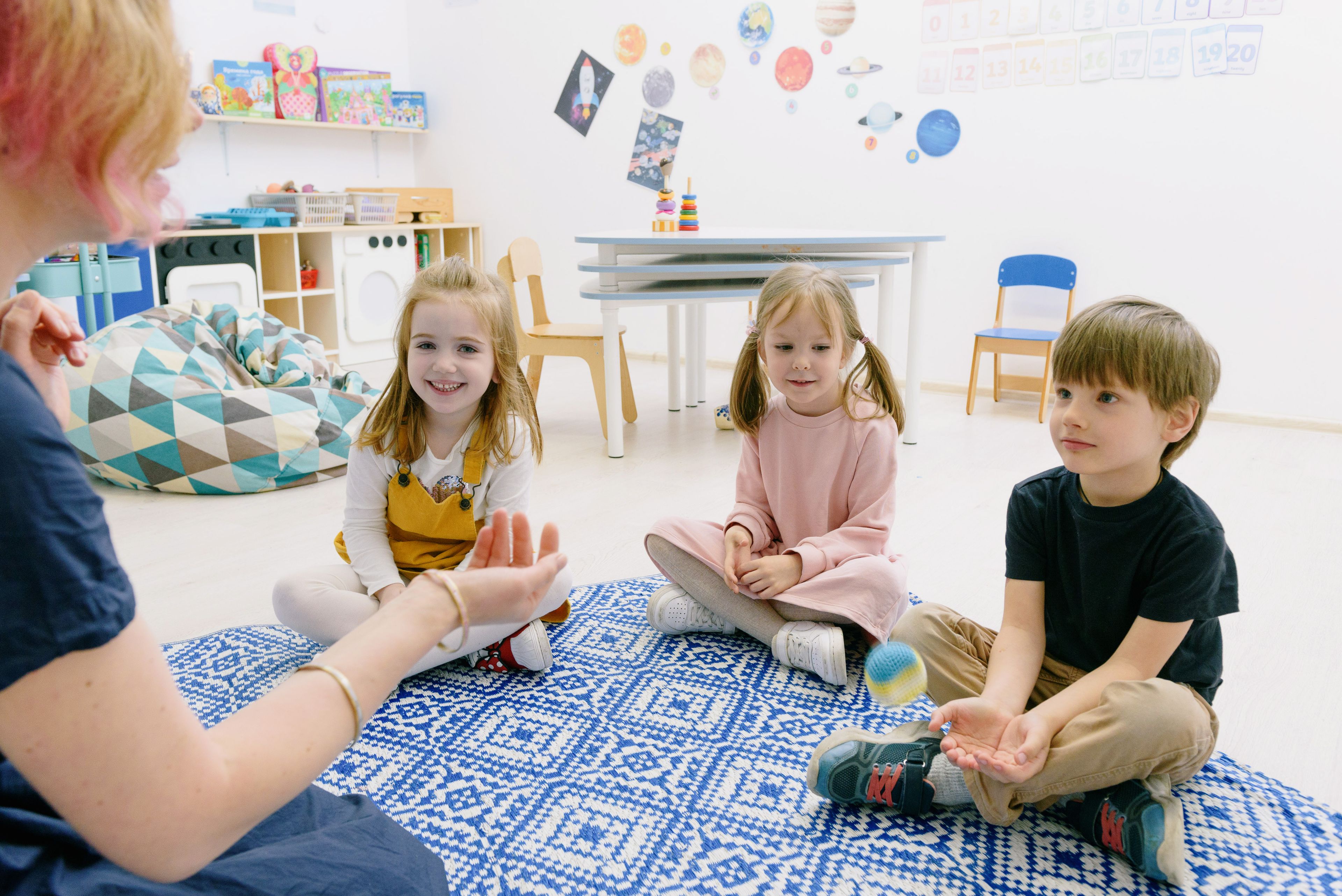 Happy children sitting together during a learning activity