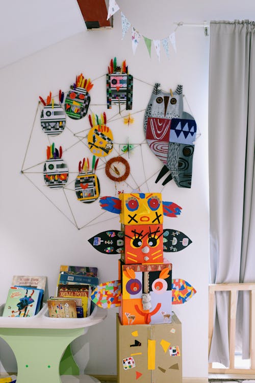 Bright Colorful Cardboard Toys and Drawings in a Kids Room