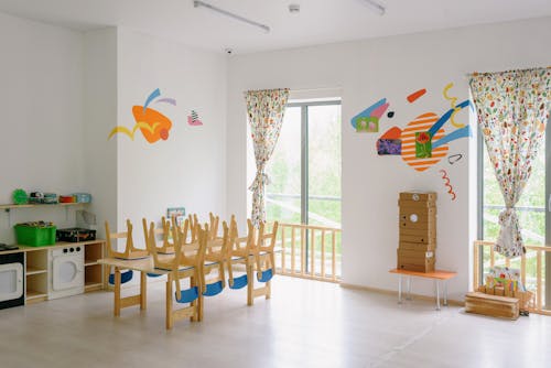 Blue and Brown Wooden Chairs in the Room