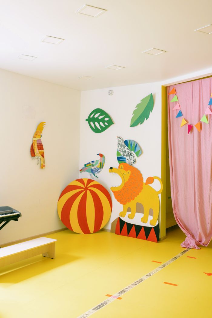 Cardboard animal figures in a playroom