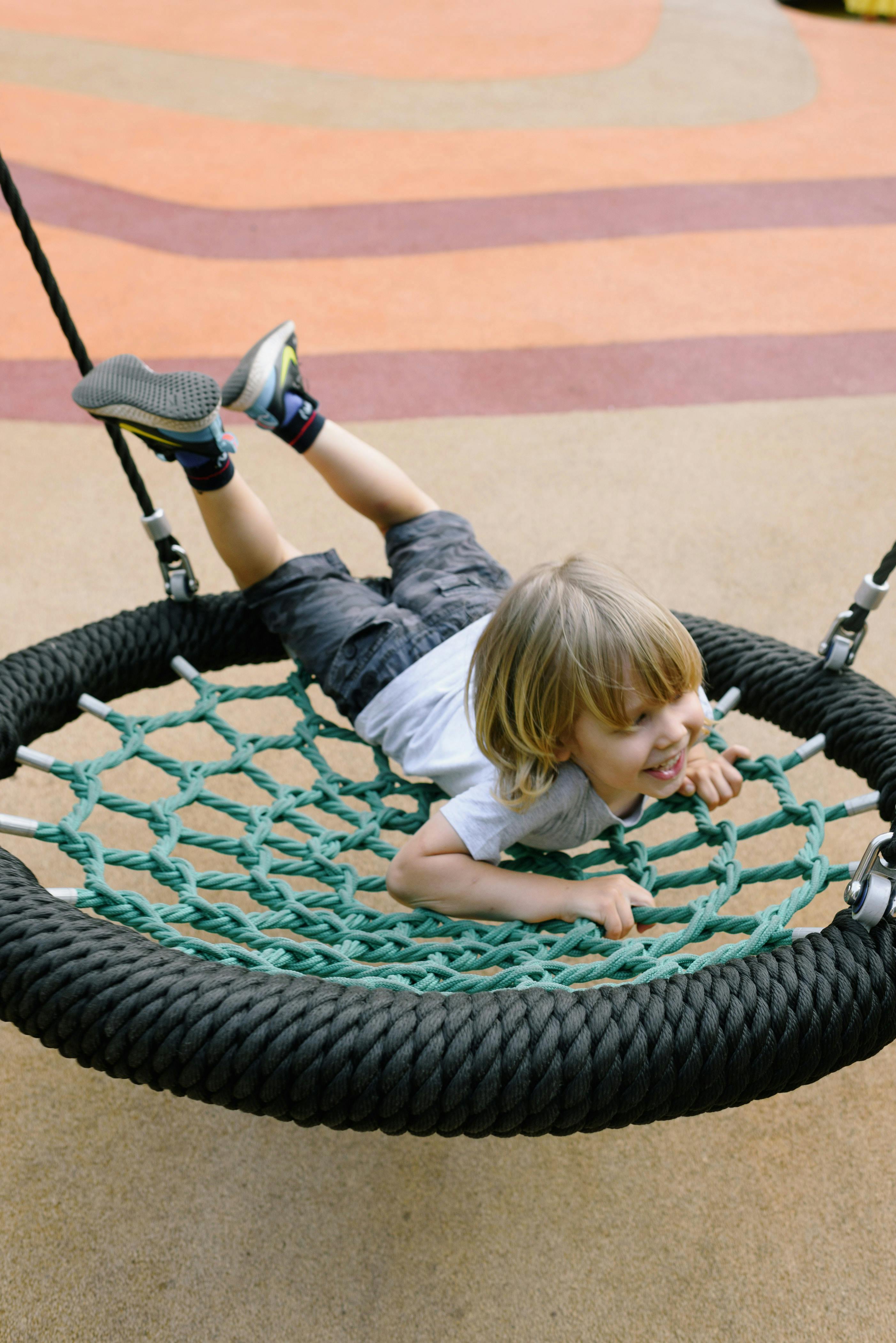 boy playing on playground