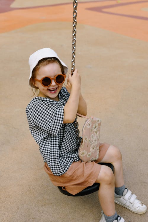 Little Girl Swinging 