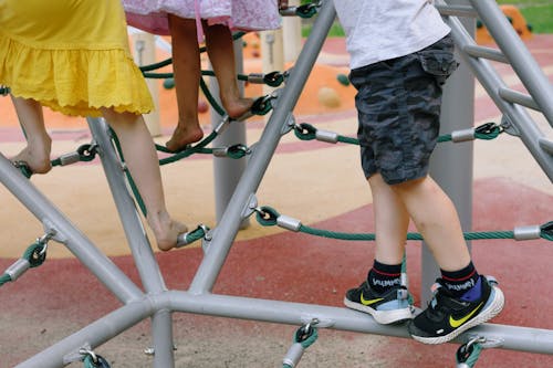 Free Boy and Girls Playing on Playground Stock Photo