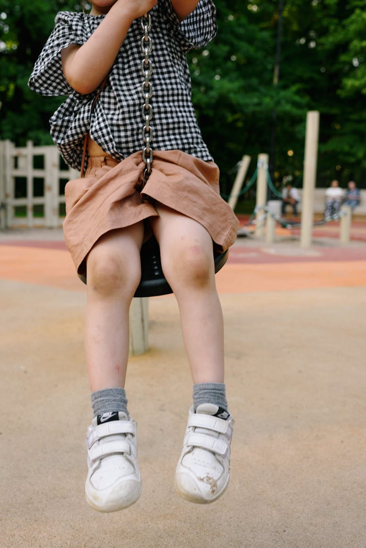 Child On A Zipline On A Playground 