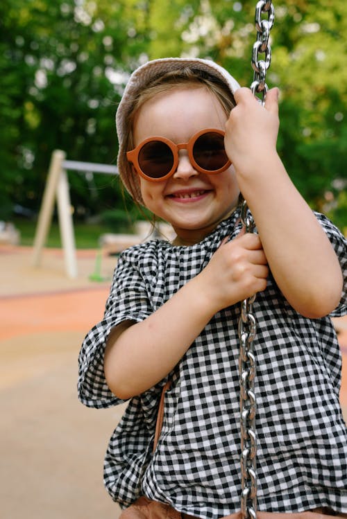 Smiling Girl Holding Chain