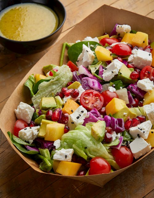 Free Vegetable Salad on Brown Paper Bowl Stock Photo