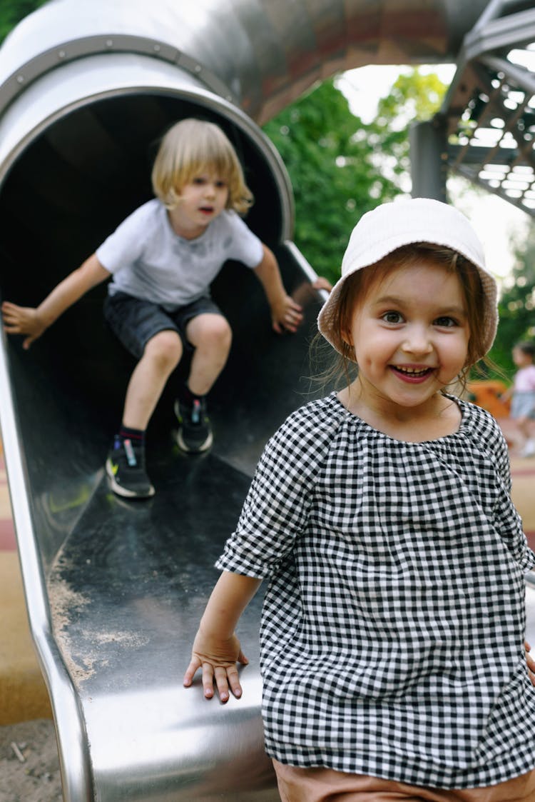 Photo Of Children On A Slide