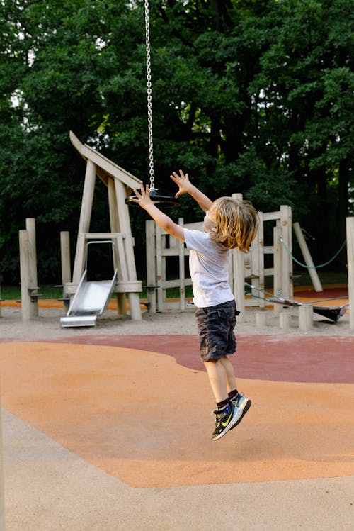 A Boy Playing in the Playground