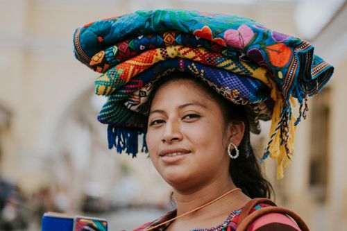 Free Smiling woman in traditional clothing in Antigua, Guatemala. Stock Photo