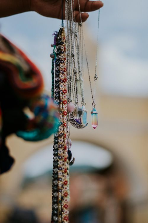 Free Close-up of handcrafted necklaces with colorful crystals in Antigua Guatemala. Stock Photo