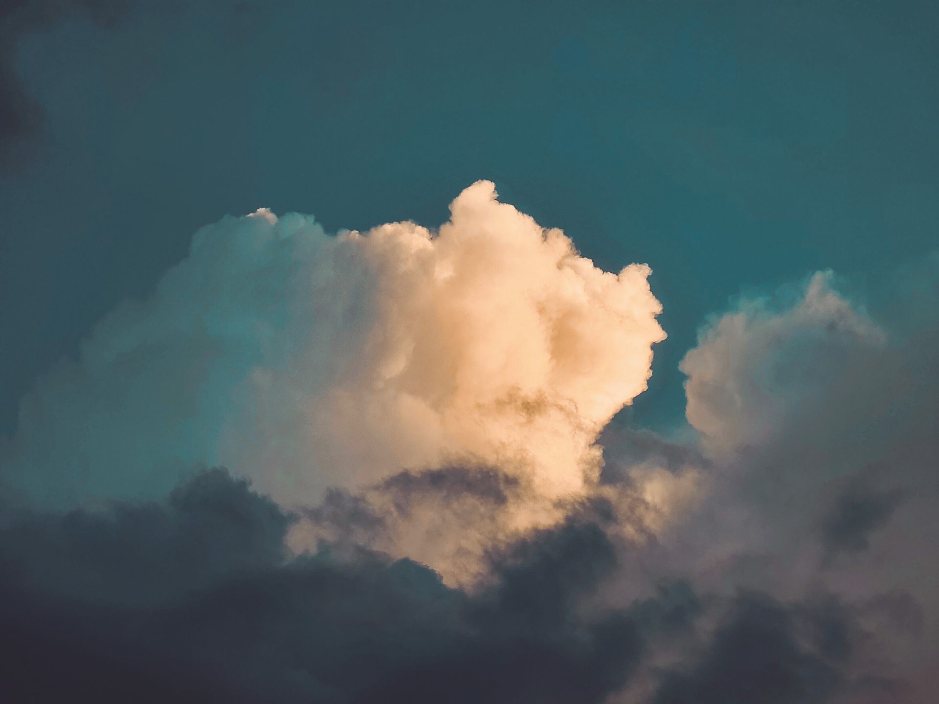 Majestic cloud formations in the Ithaca sky, capturing nature's drama and the tranquility of the atmosphere.