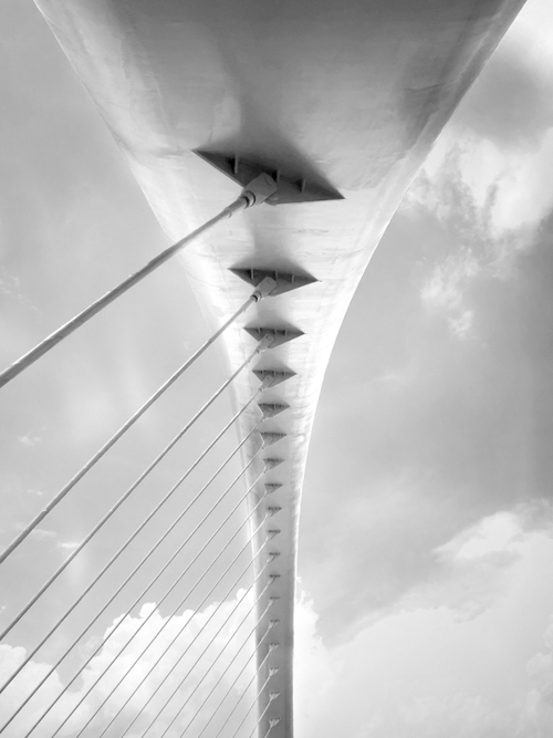 Free Striking low-angle view of a modern bridge in Guangzhou against a cloudy sky. Stock Photo