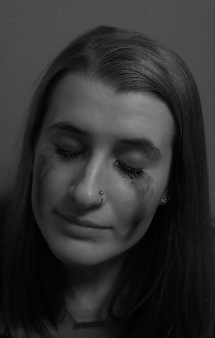 Grayscale Photo Of Woman's Face With Mascara Smudge 