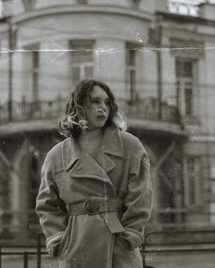 Vintage Photo Of Woman In Coat With Hands In Pockets