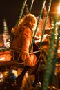 Woman Sitting on Steel  Framed Swing