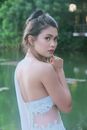 Woman in White Bare Back and Shoulder Clothing