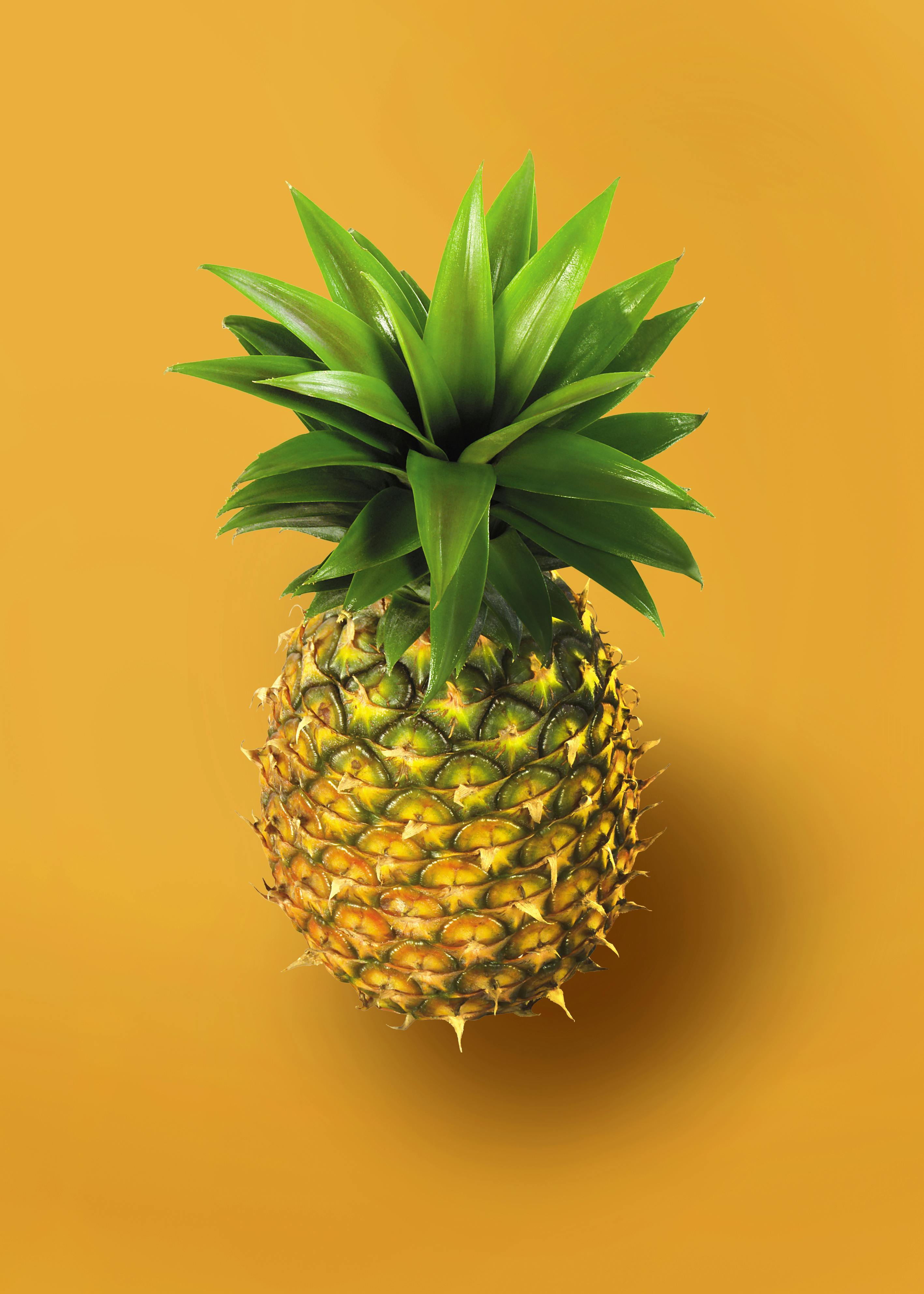 Pineapple on Yellow Background · Free Stock Photo