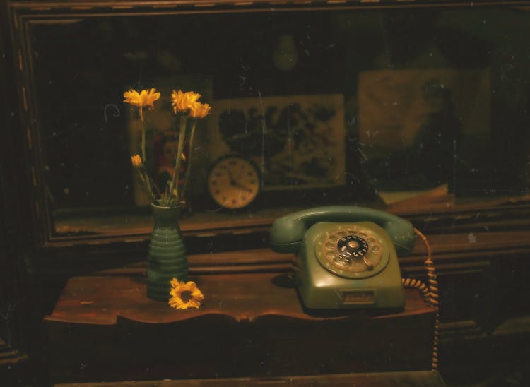 Vintage Rotary Phone And Sunflowers