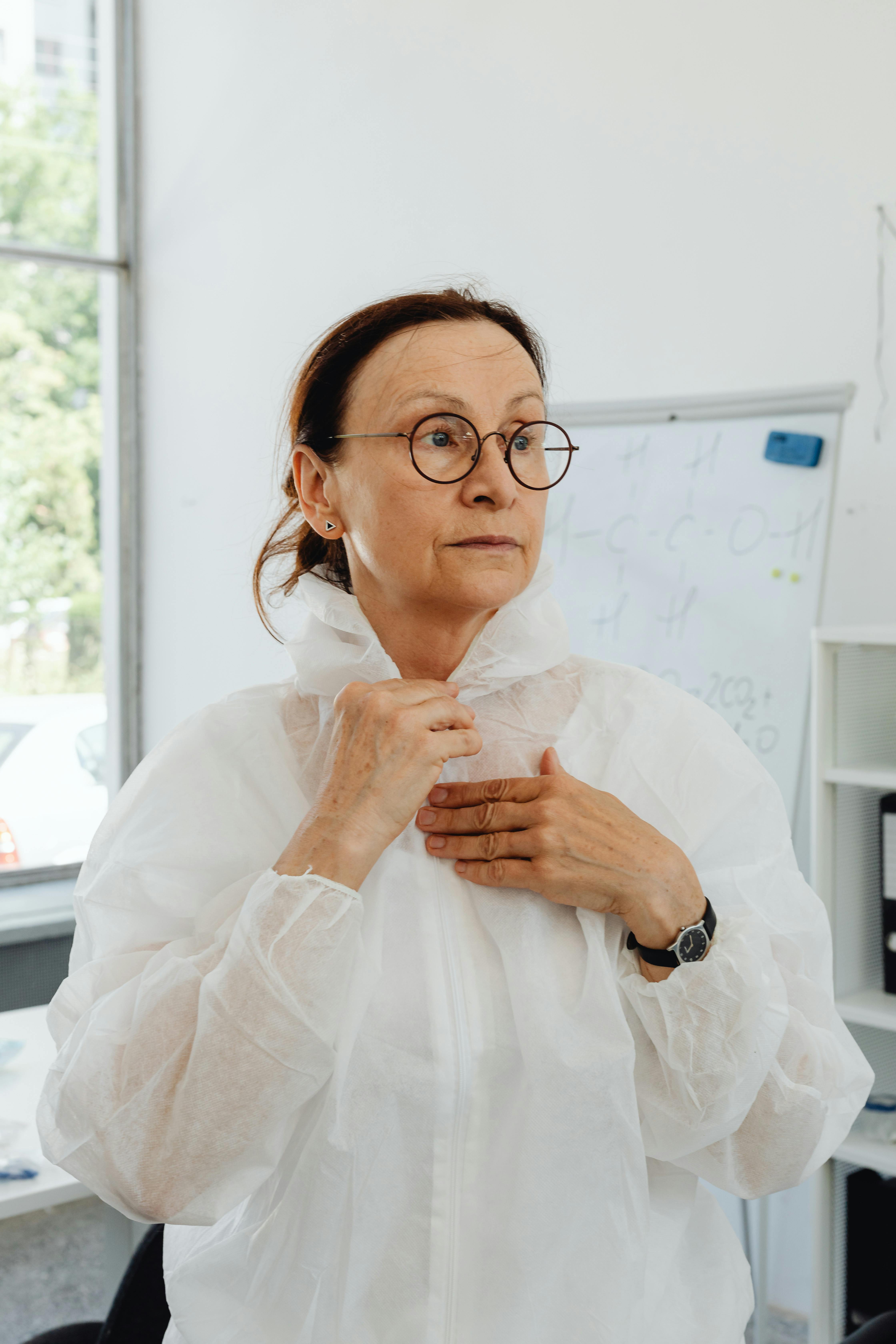 Elderly Woman wearing Personal Protective Equipment · Free Stock Photo