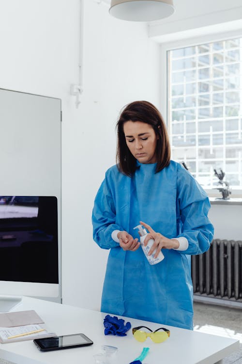 Woman Using a Pump Bottle