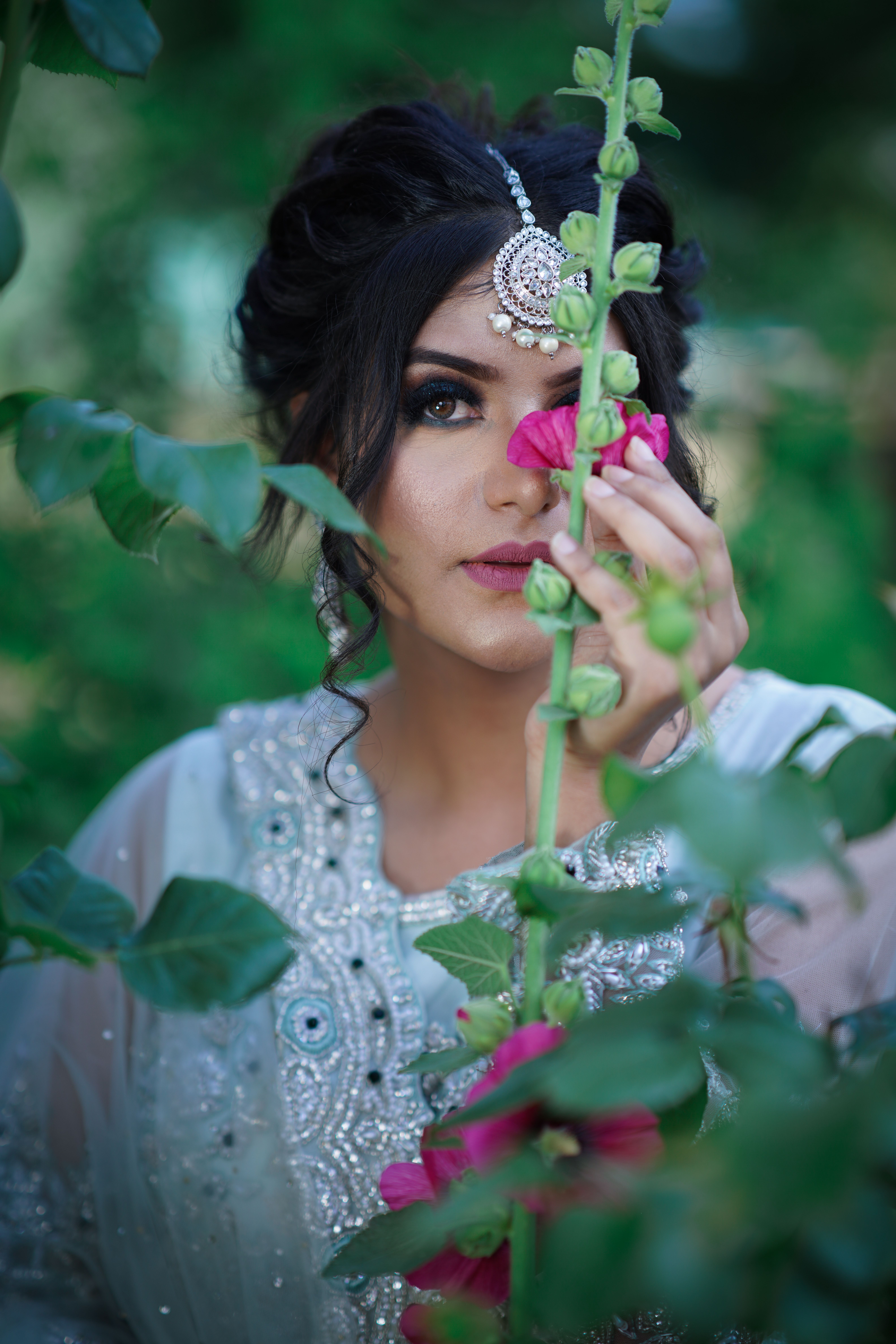 Woman in White Floral Lace Dress Holding Pink Flower · Free Stock Photo