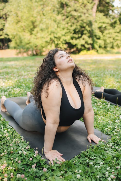 Woman in Black Sports Bra Doing Yoga