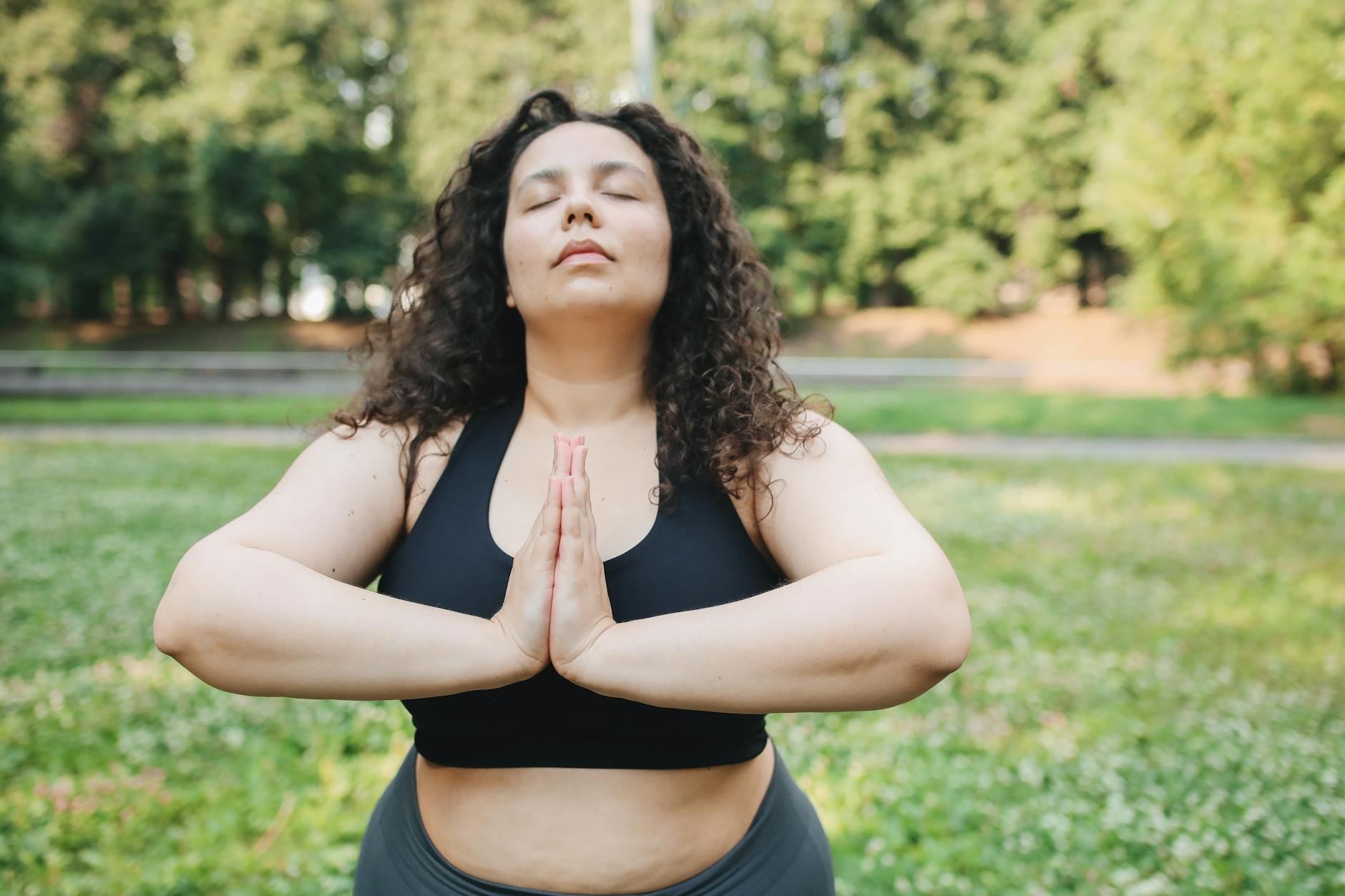 https://www.pexels.com/photo/a-woman-meditating-at-the-park-8538975/