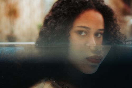 Free An evocative portrait blending realism and illusion with a unique water effect. Stock Photo