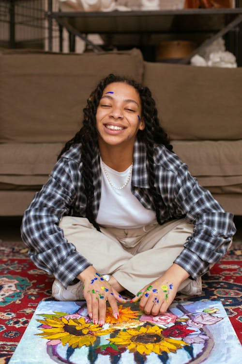 Smiling Woman Sitting on Floor