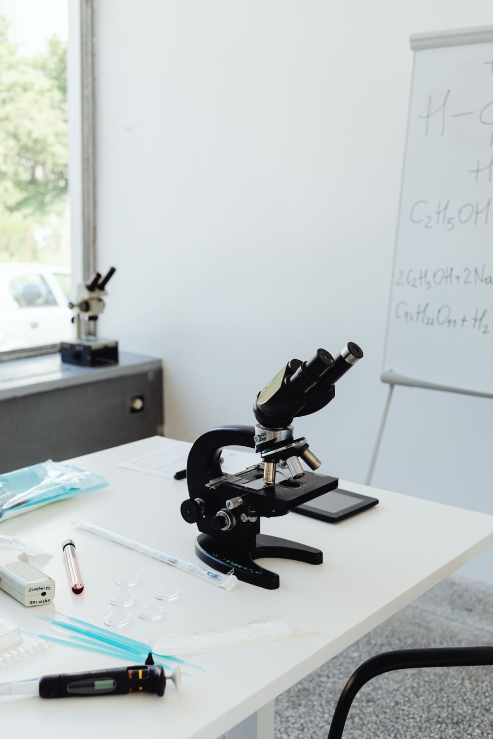 A Microscope on the Table · Free Stock Photo