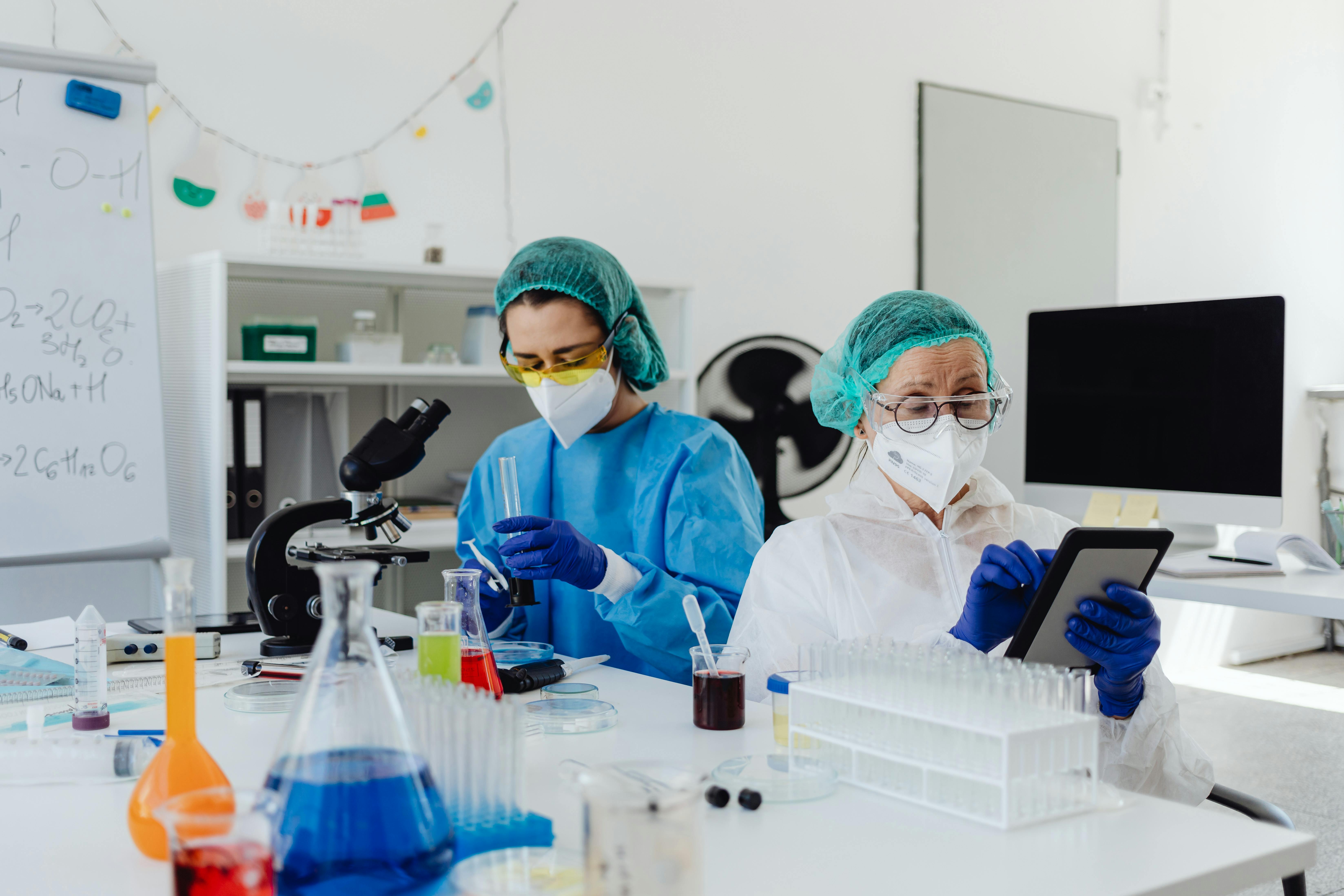 Laboratory technician handling peptide vials