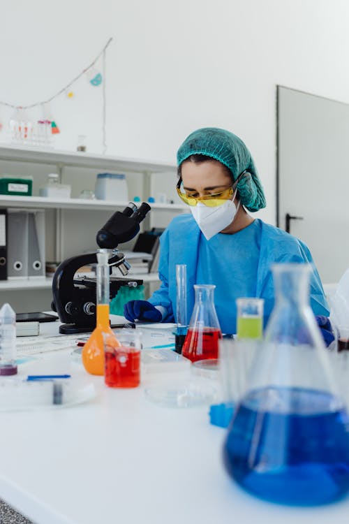 Free Woman Doing an Experiment Stock Photo