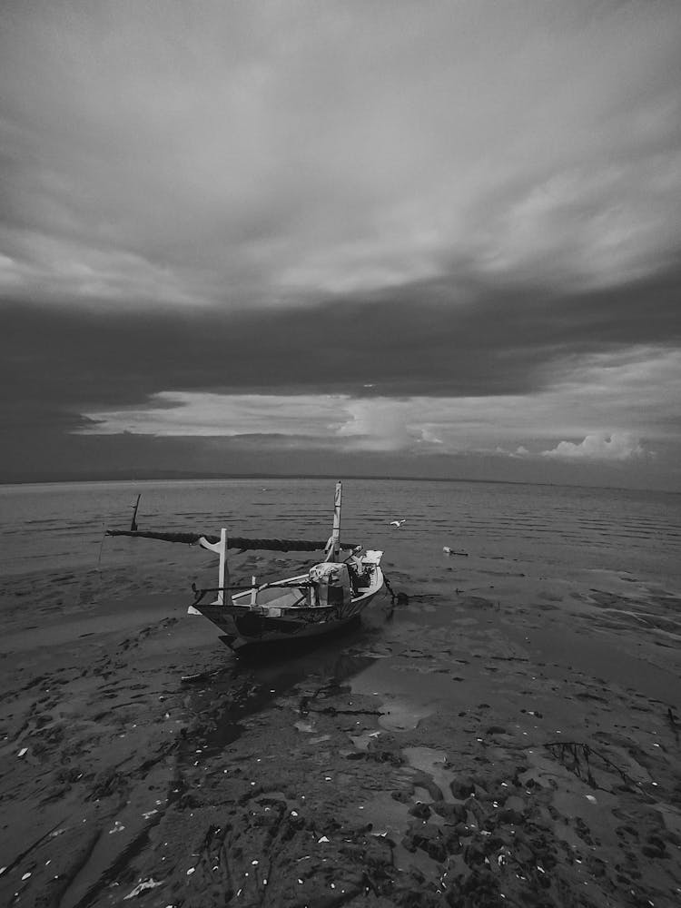 Motorboat On Shallow Shore Of Sea