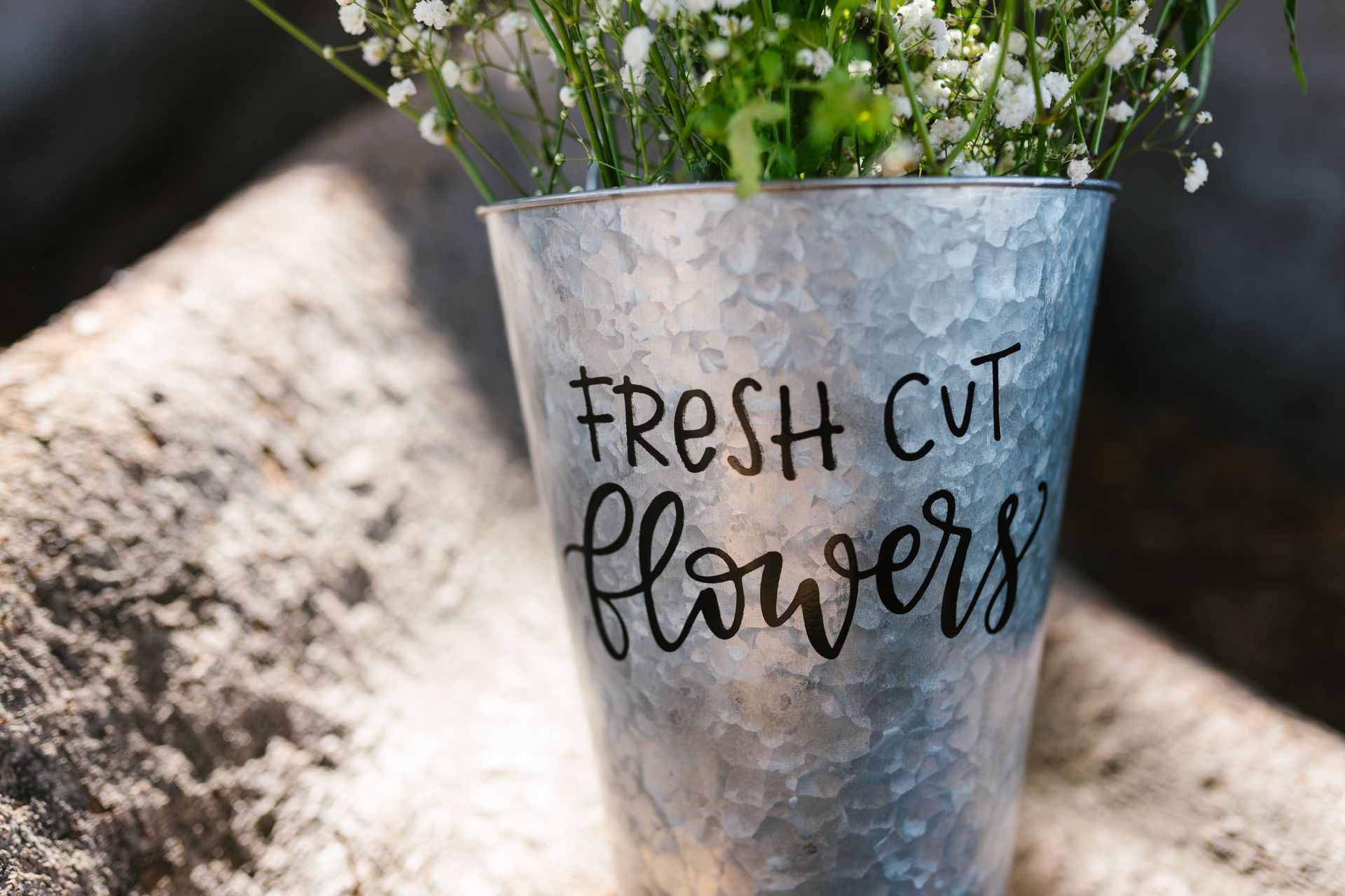 A Stainless Pot with Printed Letters