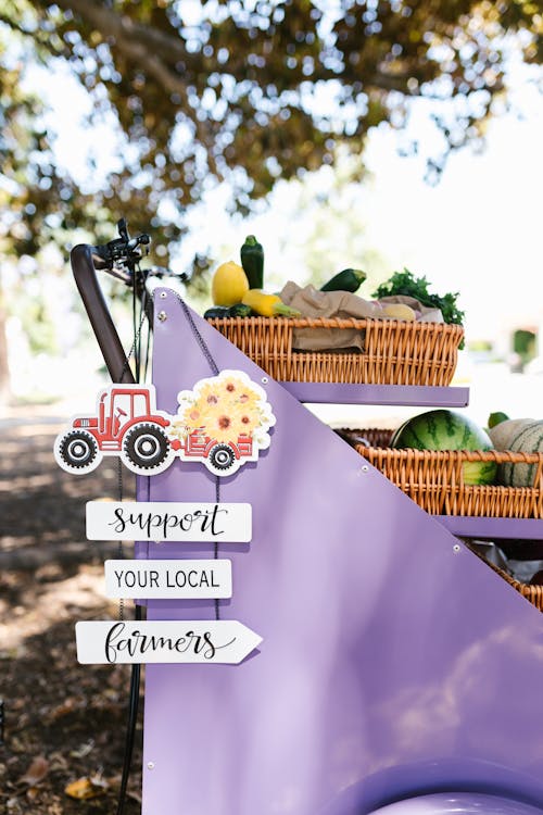 Signage of Support on Purple Shelves