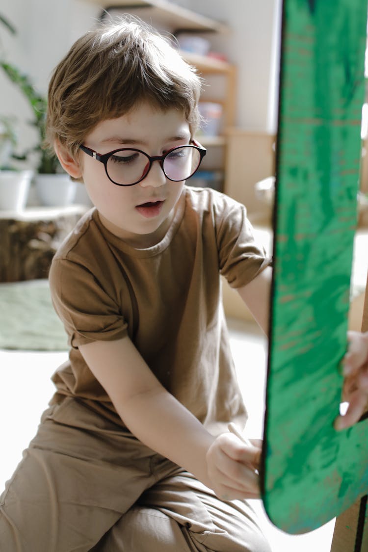 A Kid Doing An Art Project