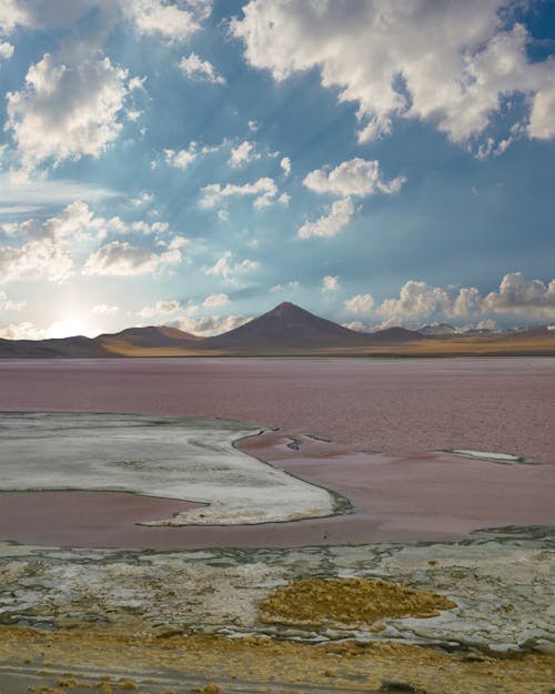 Desert Landscape against a Cloudy Sky 