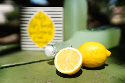 Free Yellow Lemon Fruit on Green Table Stock Photo