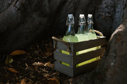 Bottles of Lemonade in a Wooden Cart