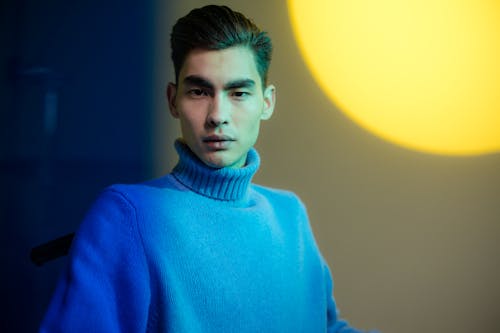 Man in Blue Turtleneck Sweater