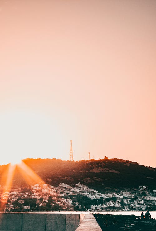 Základová fotografie zdarma na téma hory, městských budov, oceán