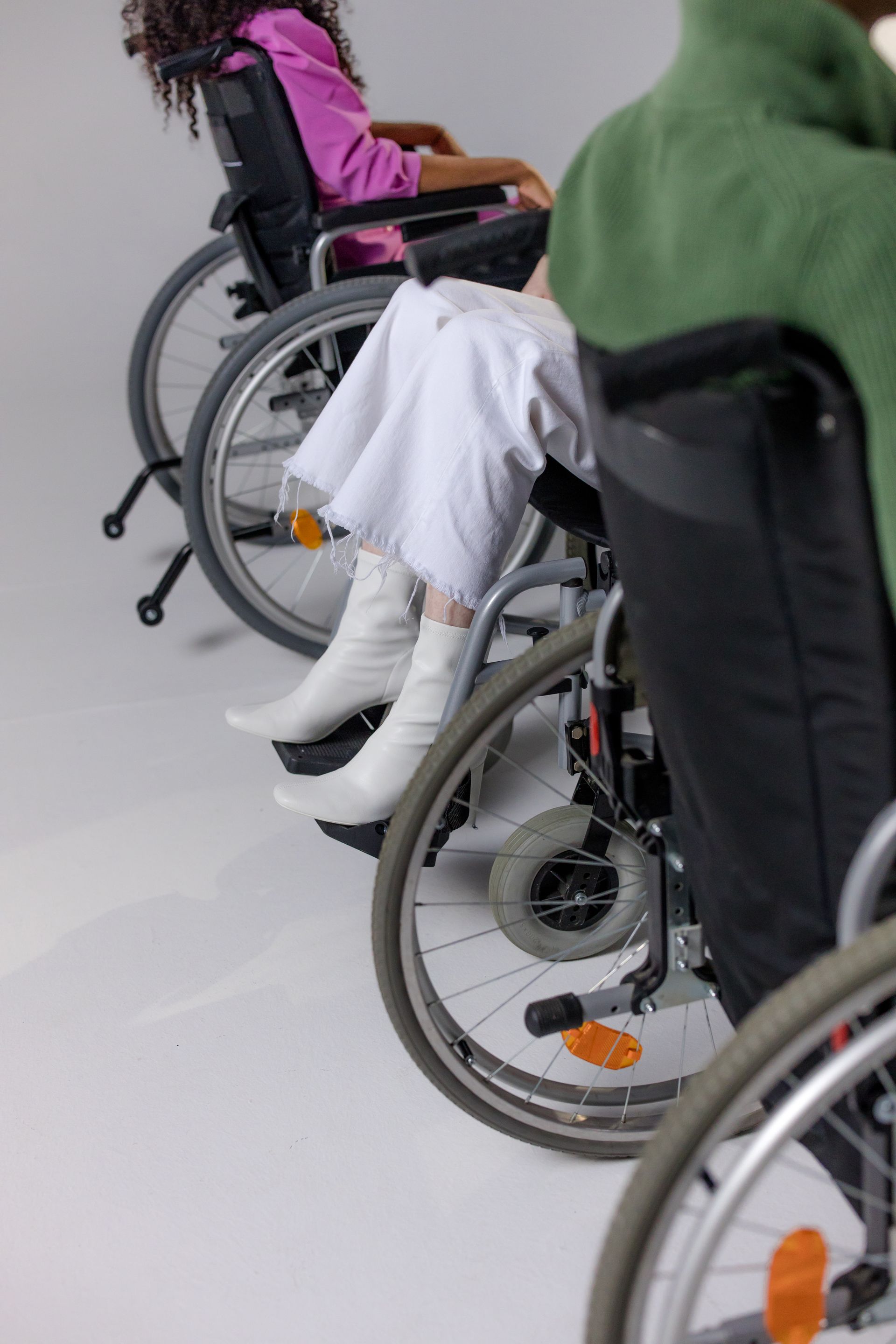 A disabled person working at a desk, illustrating dignity and inclusion in service provision