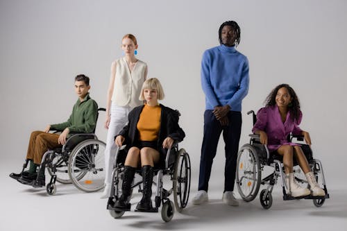 Free A Woman in a Wheelchair Wearing Black Boots Stock Photo