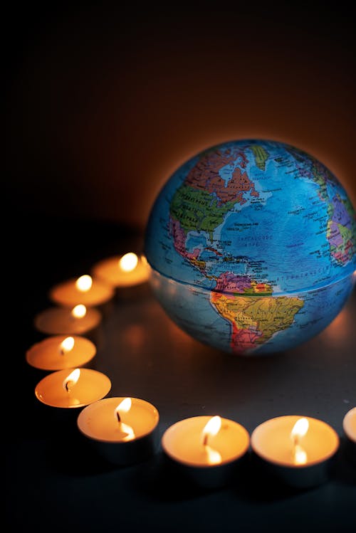 Free Round Globe Surrounded with Candles Stock Photo