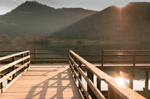 Безкоштовне стокове фото на тему «Денне світло, дерев'яні док, Захід сонця»