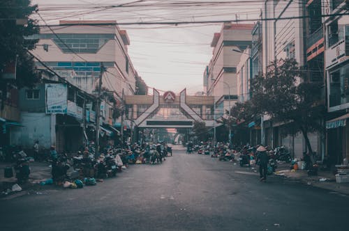 Old Photograph of an Asian City Street with Motorbikes