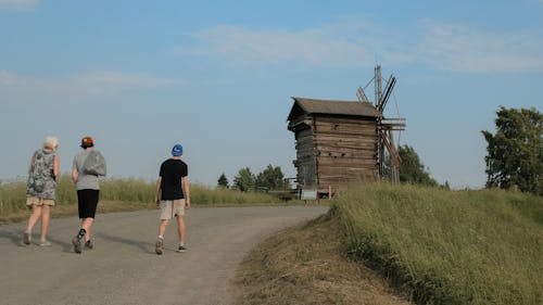 People Going to the Wooden Windmill